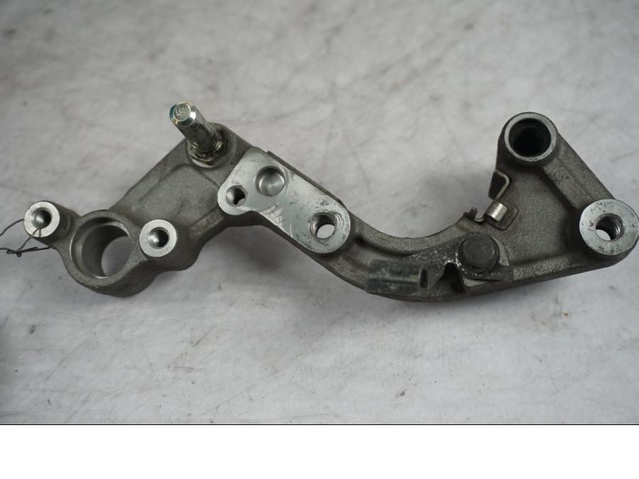 Vänster sida på Bromsoksfäste från en Honda XL 1000 V -2008 motorcykel.