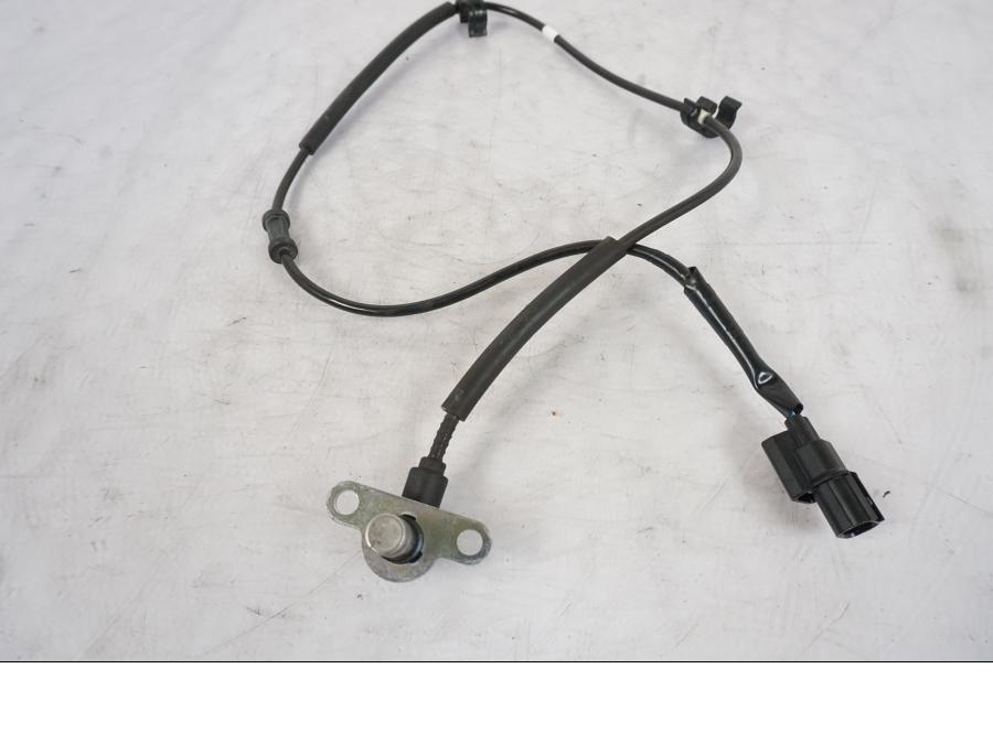 Framsidan på ABS givare från en Kawasaki Z 800 -2014 motorcykel.