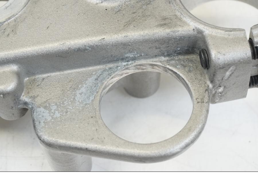 Vänster sida på Gaffelkrona från en Yamaha WR 125 -2011 motorcykel.