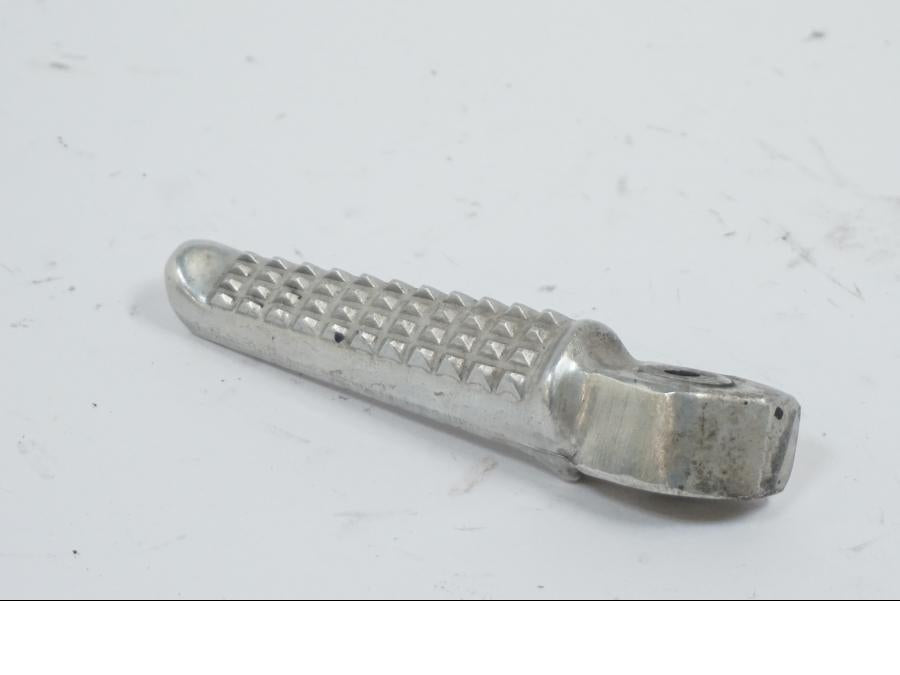 Vänster sida på Fotpinne från en Honda VTR 1000 F -1999 motorcykel.