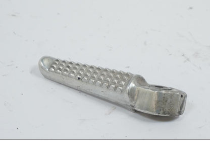 Vänster sida på Fotpinne från en Honda VTR 1000 F -1999 motorcykel.