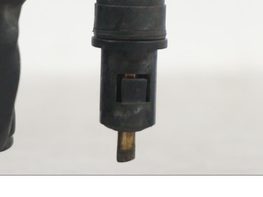 Vänster sida på Styrelreglage från en Triumph Tiger -2009 motorcykel.