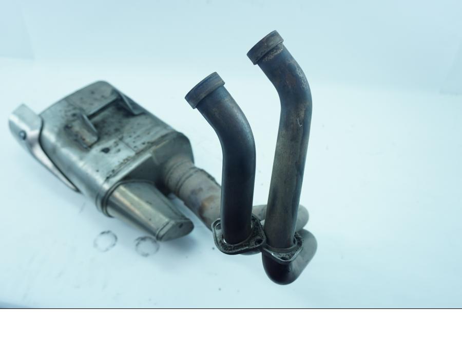 Vänster sida på Ljuddämpare från en Kawasaki Ninja 650 -2018 motorcykel.