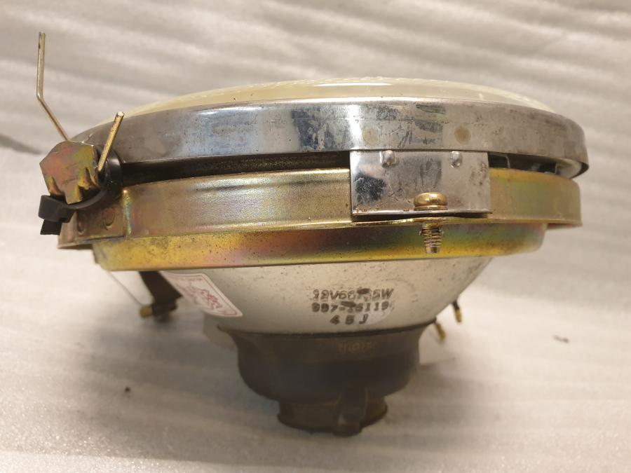 Vänster sida på Strålkastarinsats från en Yamaha XV 1600 -2002 motorcykel.