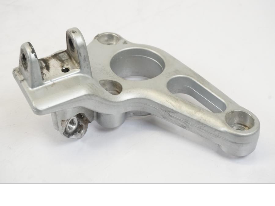 Vänster sida på Fotpinnefäste från en BMW R 1150 RS -2003 motorcykel.