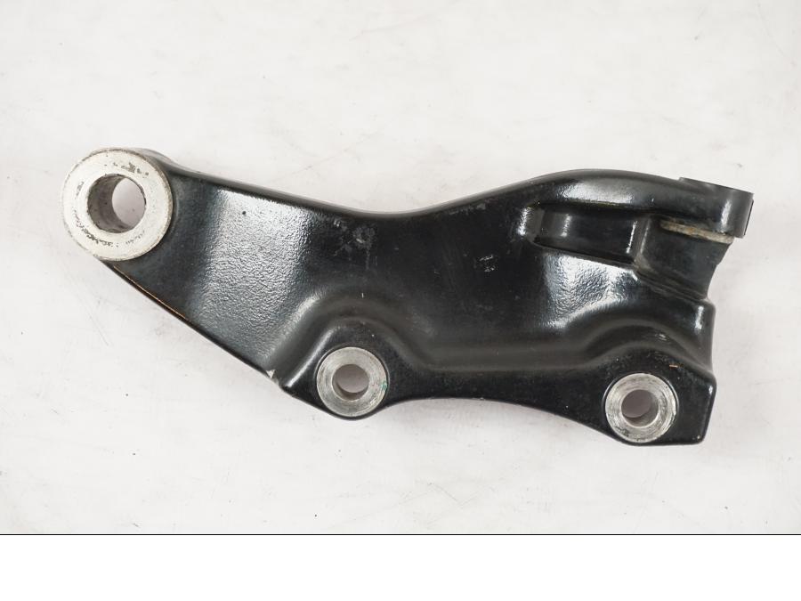 Framsidan på Bromsoksfäste från en Yamaha XVS 1100 -2000 motorcykel.