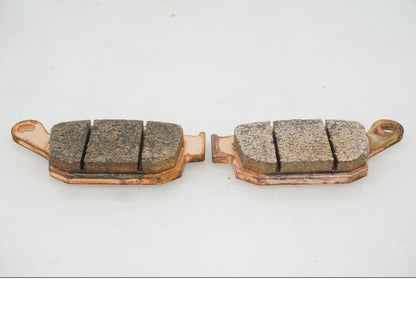 Snett uppifrån på Bromsbelägg från en Universal Universal -1997 motorcykel.