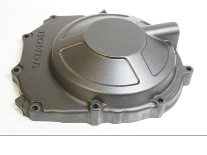 Vänster sida på Kopplingskåpa från en Honda CBR 900 RR -1995 motorcykel.
