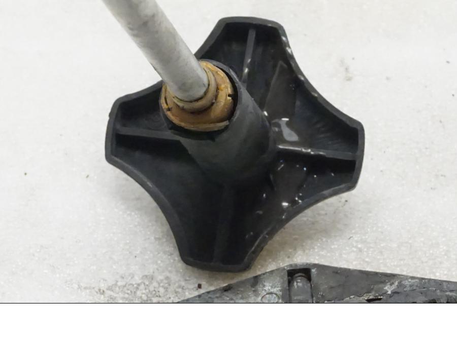 Höger sida på Styrdämpare från en BMW R 90 -1975 motorcykel.