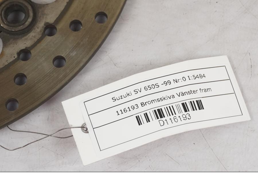Baksidan på Bromsskiva från en Suzuki SV 650 -1999 motorcykel.