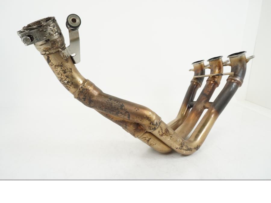 Snett nerifrån på Grenrör från en Triumph Speed Triple -2008 motorcykel.