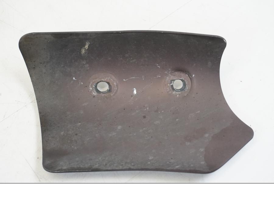 Vänster sida på Värmeskydd från en Ducati Streetfighter S -2011 motorcykel.