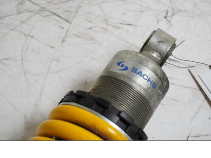 Vänster sida på Stötdämpare från en Ducati Monster 696 -2008 motorcykel.