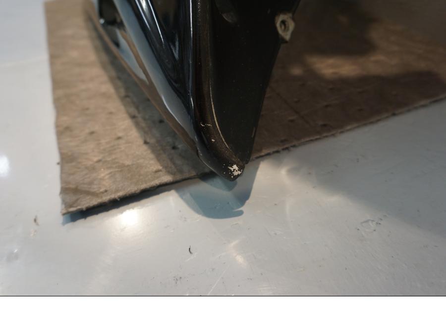 Vänster sida på Sidkåpa från en Honda NSR 125 -1998 motorcykel.