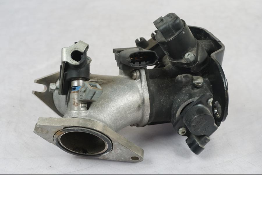 Extrabild4 på Spjällhus från en H-D Sportster 883 XL -2007 motorcykel.