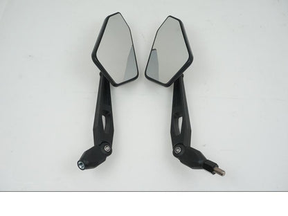 Höger sida på Backspegel från en Universal Universal -2024 moped.