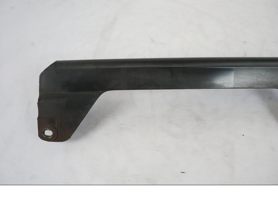 Baksidan på Kedjeskydd från en Honda CBR 125 R -2006 motorcykel.