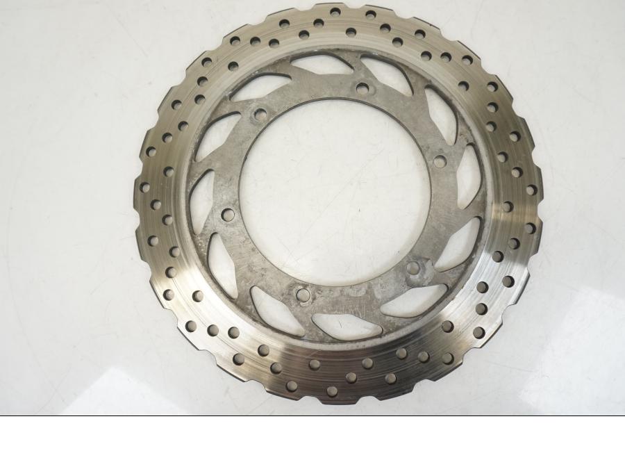 Vänster sida på Bromsskiva från en Yamaha XT 1200 A -2010 motorcykel.