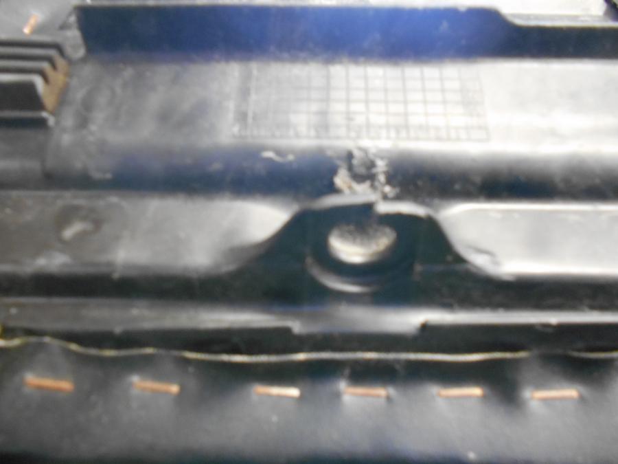 Snett nerifrån på Sadel från en Honda CBR 125 R -2007 motorcykel.