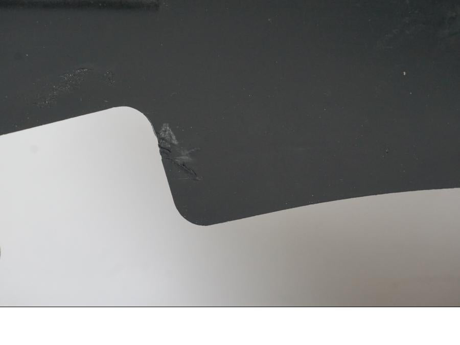 Vänster sida på Värmeskydd från en Suzuki GSX-R 750 -2009 motorcykel.