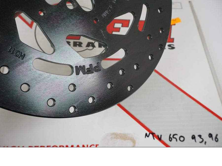 Vänster sida på Bromsskiva från en Honda NTV 650 -1996 motorcykel.