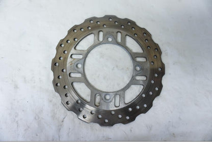 Framsidan på Bromsskiva från en Kawasaki Z 800 -2013 motorcykel.