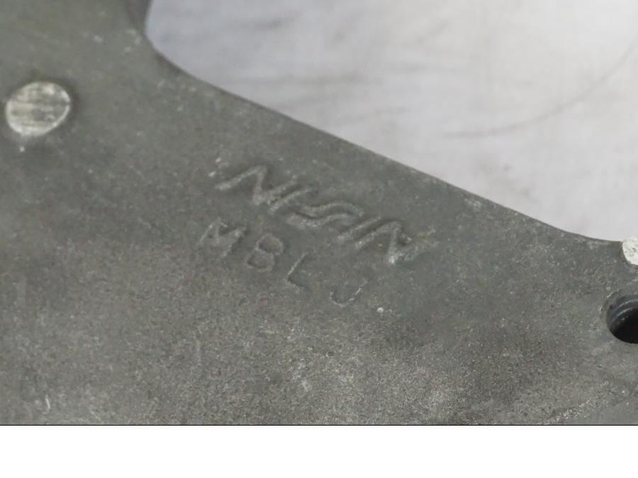 Baksidan på Bromsoksfäste från en Honda NT 650 V -2002 motorcykel.