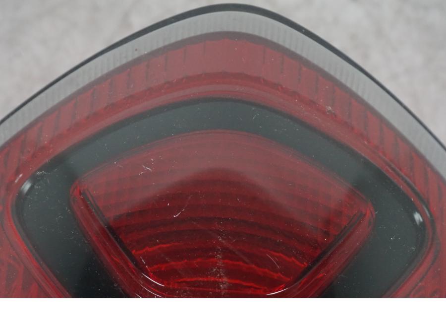 Höger sida på Baklampa från en Honda ANC 125 -2022 scooter.