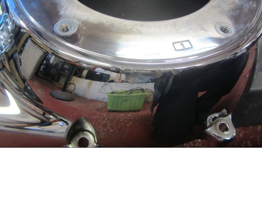 Vänster sida på Transmissionskåpa från en H-D Street Glide FLHX -2018 motorcykel.