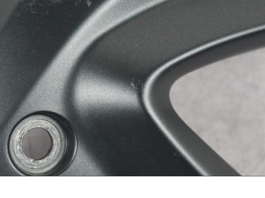 Baksidan på Strålkastarkåpa från en Suzuki GSF 1250 -2010 motorcykel.