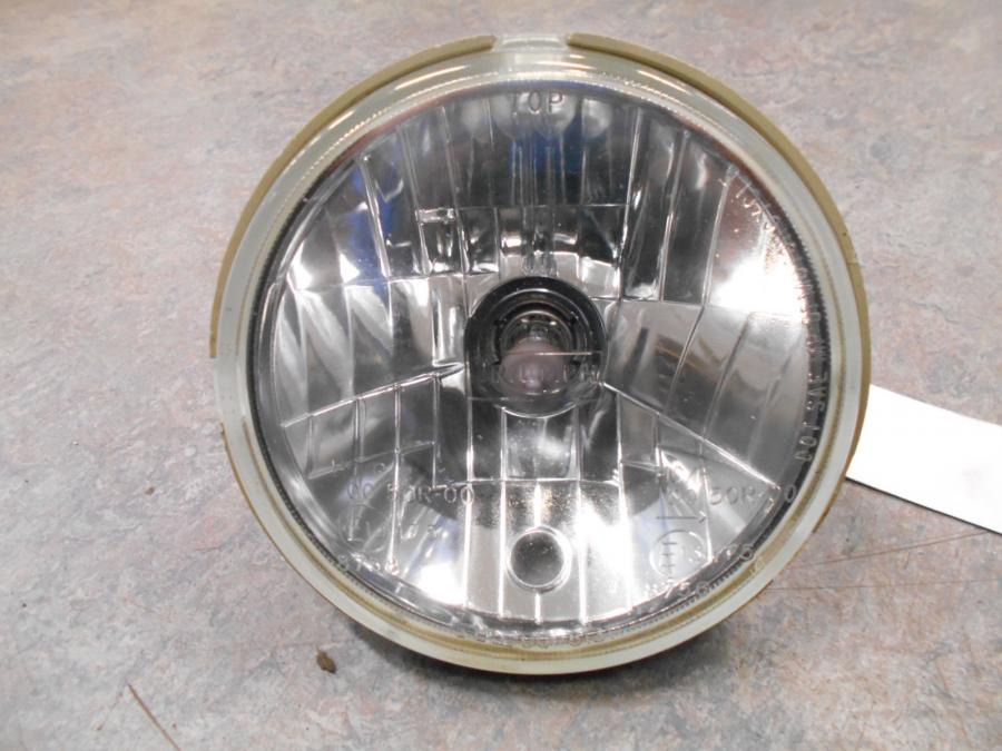 Framsidan på Strålkastarinsats från en Triumph Street Triple -2009 motorcykel.