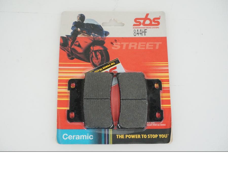 Framsidan på Bromsbelägg från en Aprilia RS 125 -2013 motorcykel.