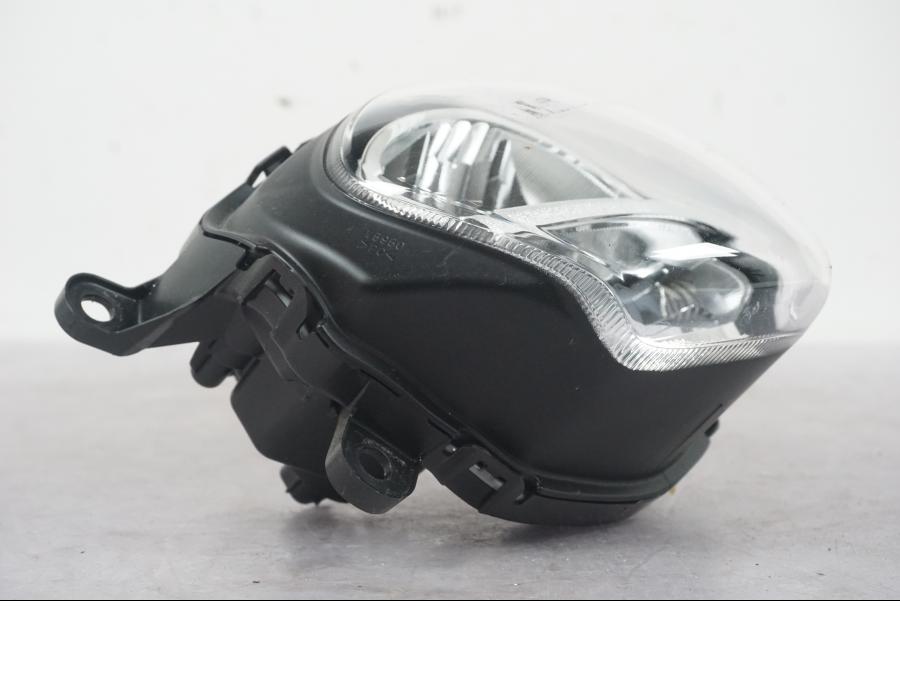 Höger sida på Strålkastare från en Honda ANC 125 -2022 scooter.