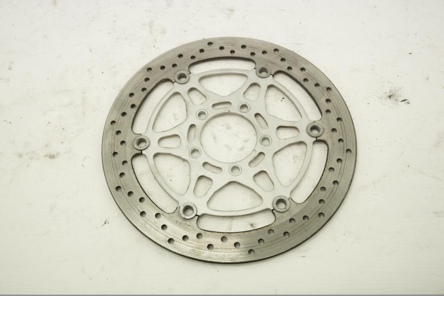 Framsidan på Bromsskiva från en Suzuki DL 1000 -2005 motorcykel.