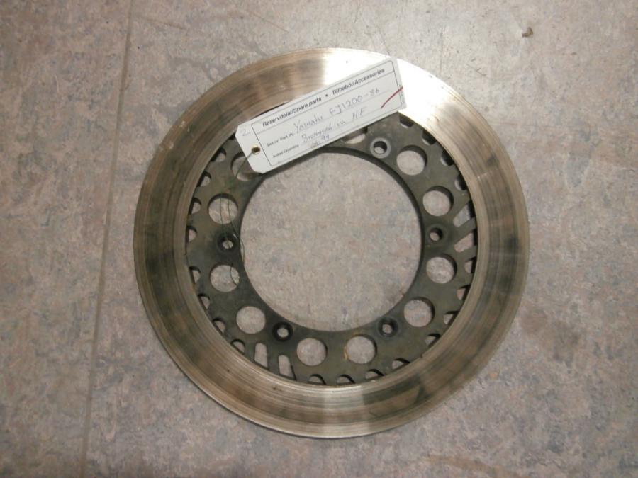 Framsidan på Bromsskiva från en Yamaha FJ 1200 -1986 motorcykel.