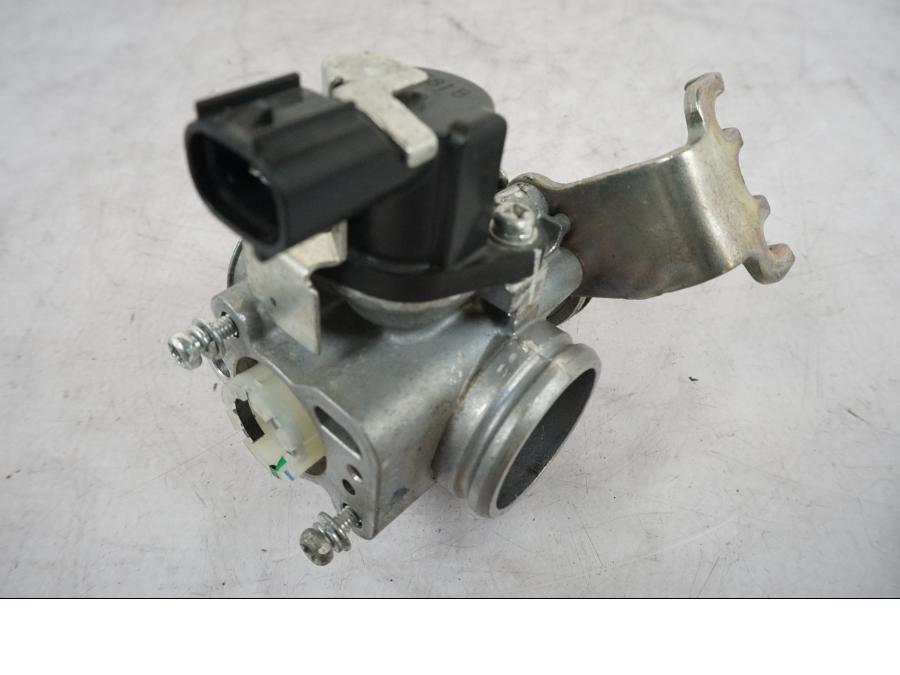 Framsidan på Spjällhus från en Yamaha MT 125 -2017 motorcykel.