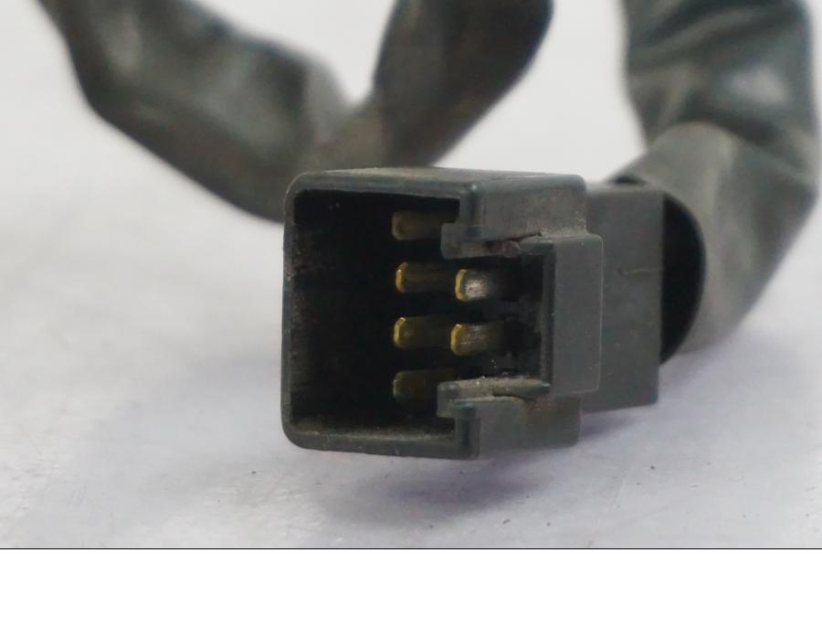 Baksidan på Styrelreglage från en Triumph Tiger -2009 motorcykel.