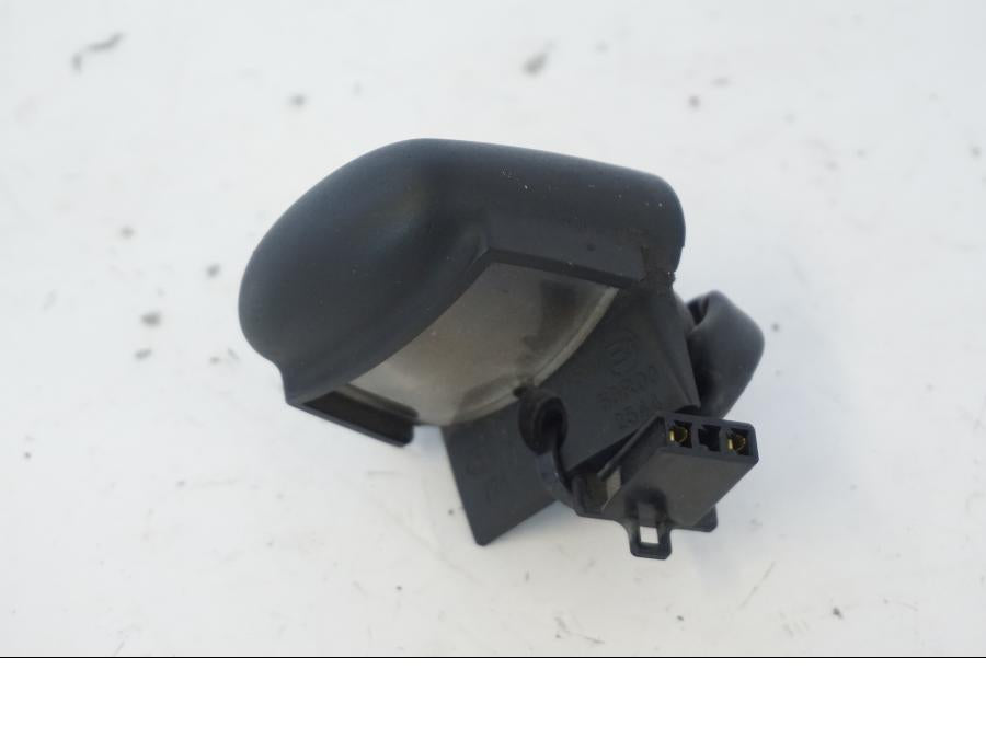 Baksidan på Skyltbelysning från en Honda SH 300 A -2011 scooter.