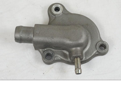 Framsidan på Vattenpump från en Honda CBR 125 R -2006 motorcykel.