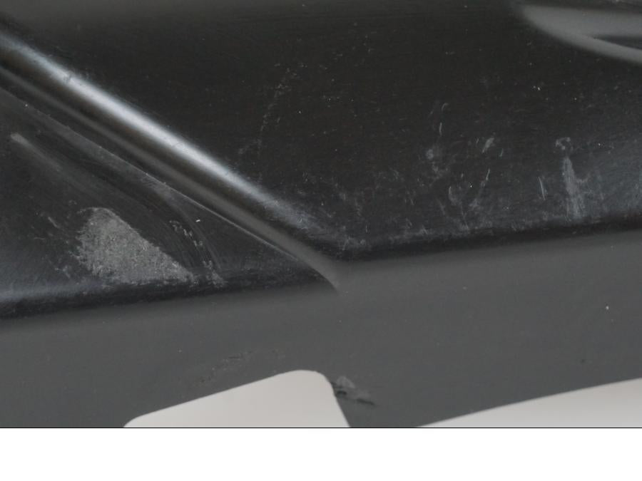 Baksidan på Värmeskydd från en Suzuki GSX-R 750 -2009 motorcykel.