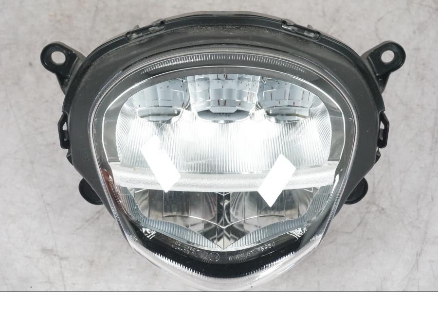 Baksidan på Strålkastare från en Honda ANC 125 -2022 scooter.