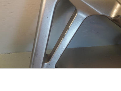 Baksidan på Fotpinnefäste från en Honda VFR 800 -2000 motorcykel.