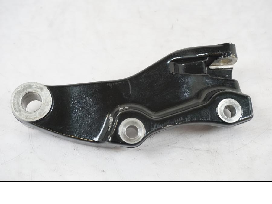 Snett uppifrån på Bromsoksfäste från en Yamaha XVS 1100 -2004 motorcykel.