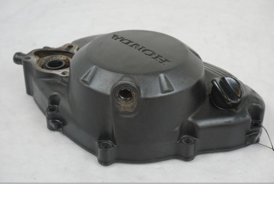 Vänster sida på Kopplingskåpa från en Honda CBR 125 R -2006 motorcykel.