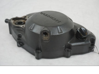 Vänster sida på Kopplingskåpa från en Honda CBR 125 R -2006 motorcykel.