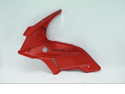 Baksidan på Sidkåpa från en Honda CB 500 F -1998 motorcykel.