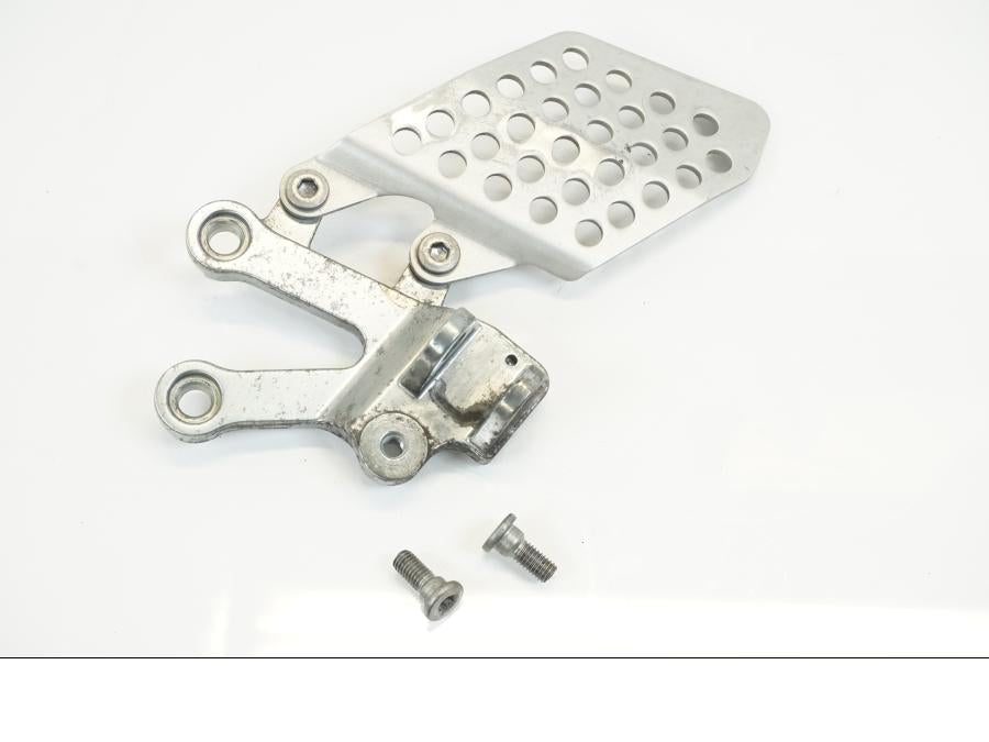 Framsidan på Fotpinnefäste från en Kawasaki ZX-12R -2000 motorcykel.