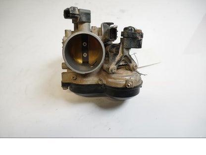 Baksidan på Spjällhus från en Husaberg 390 FE -2012 motorcykel.