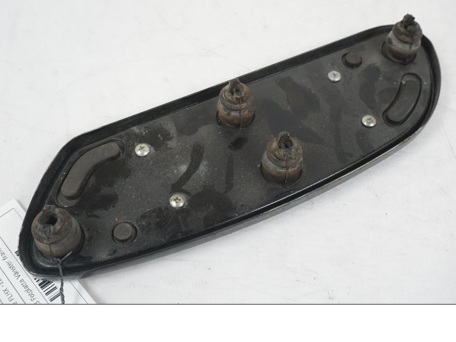 Vänster sida på Fotplatta från en H-D Street Glide FLHX -2012 motorcykel.