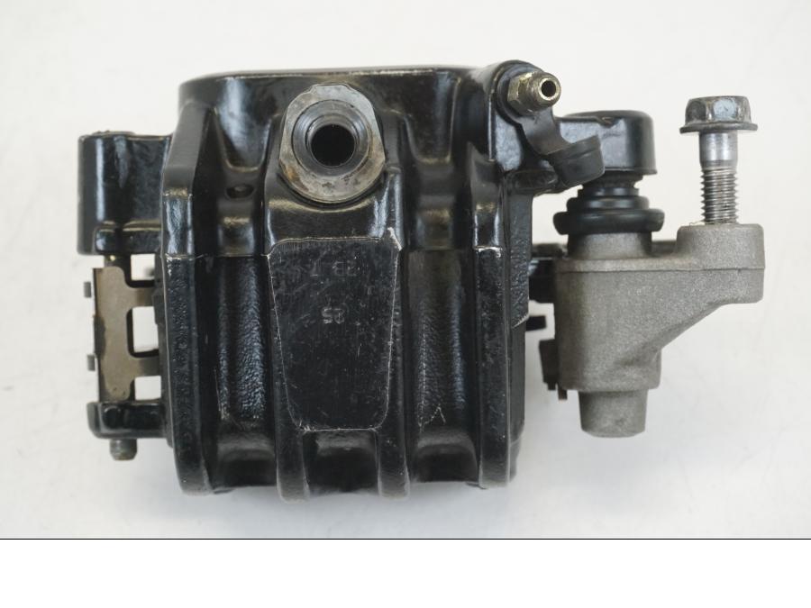 Vänster sida på Bromsok från en Honda CB 750 -2002 motorcykel.